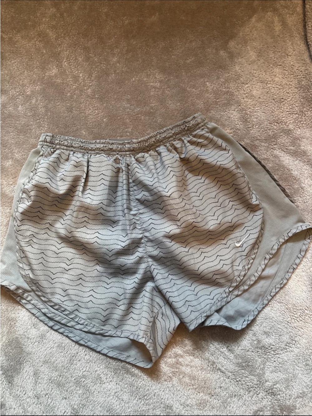Nike Women's Gray Athletic Running Shorts with Subtle Wave Pattern